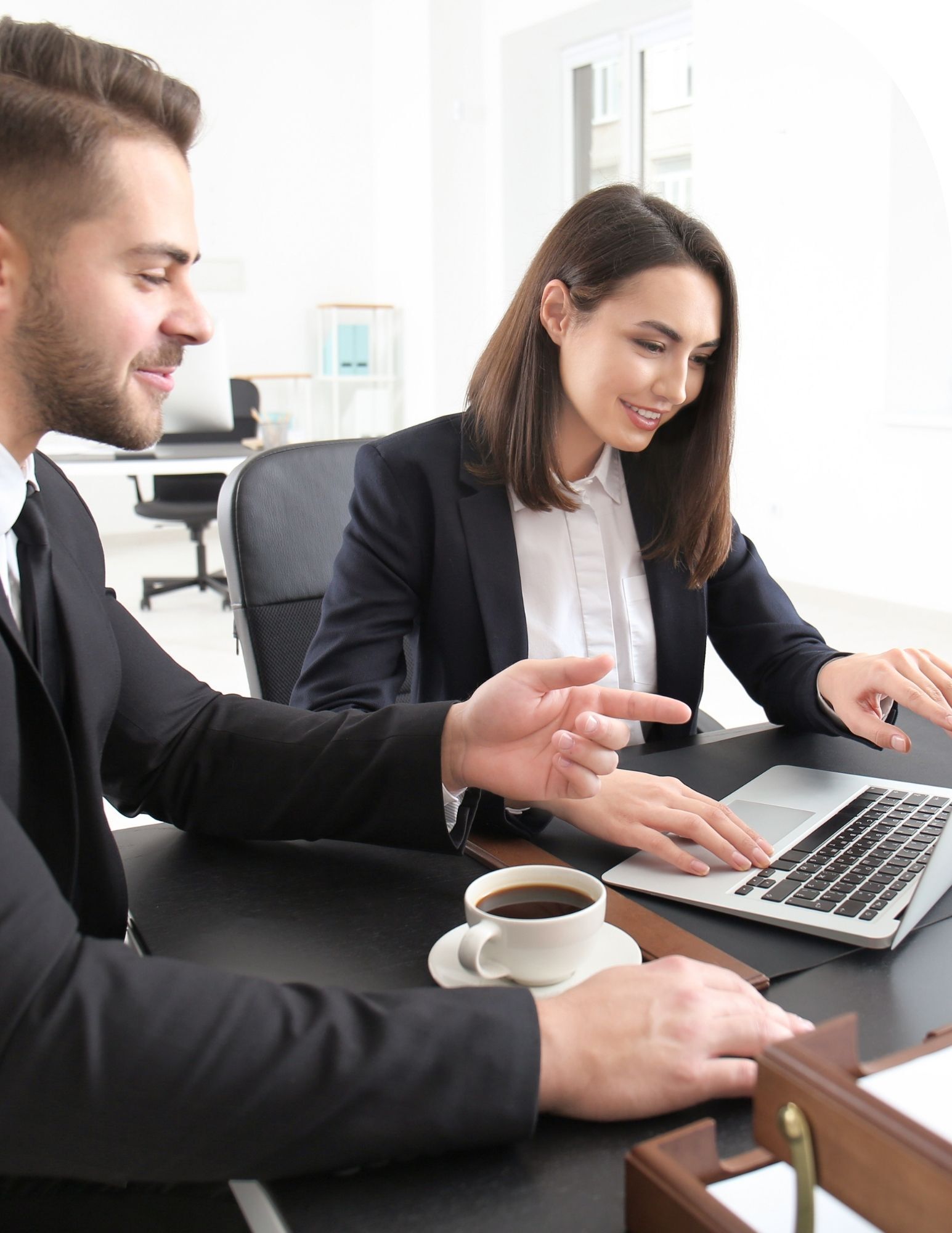 Legal team looking at work laptop